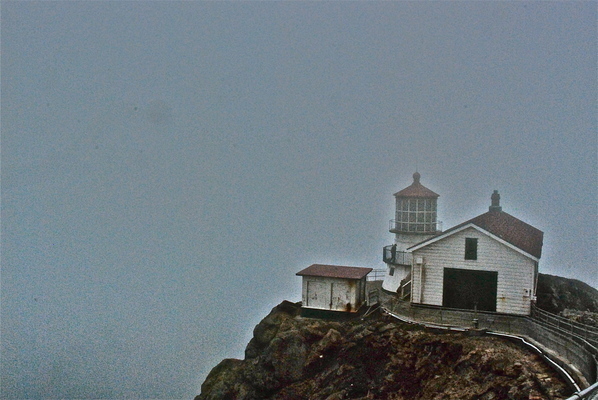 lighthouse and fog